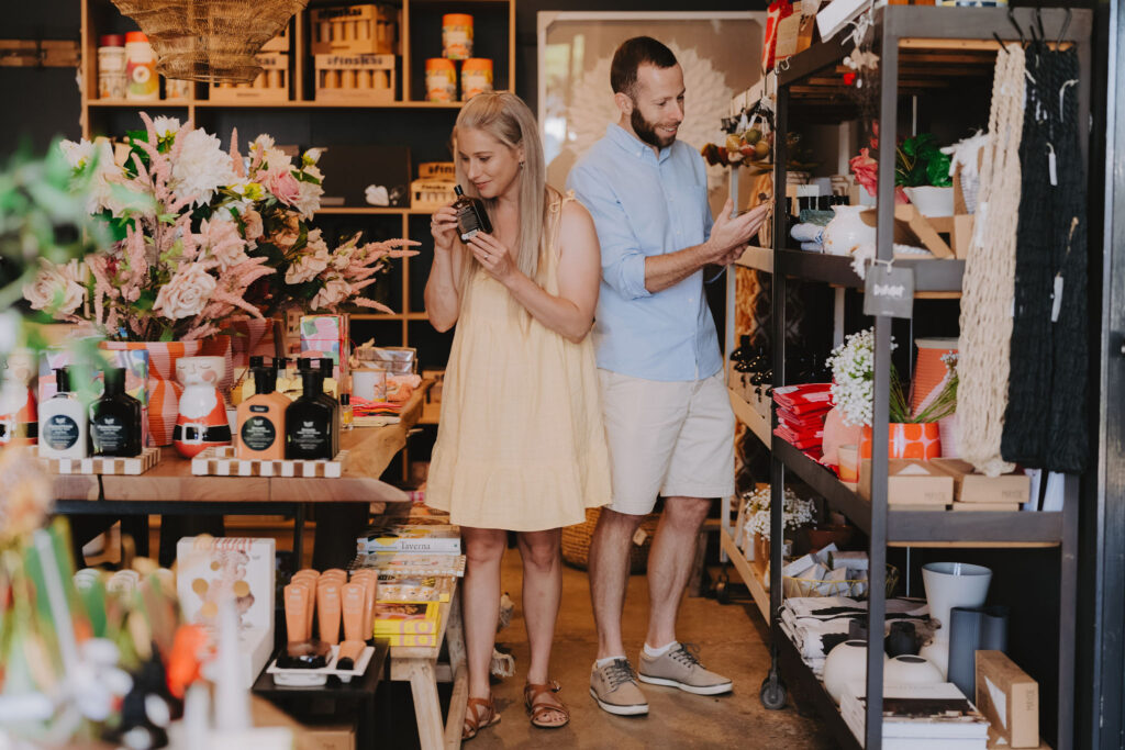 A couple looking at items in a shop